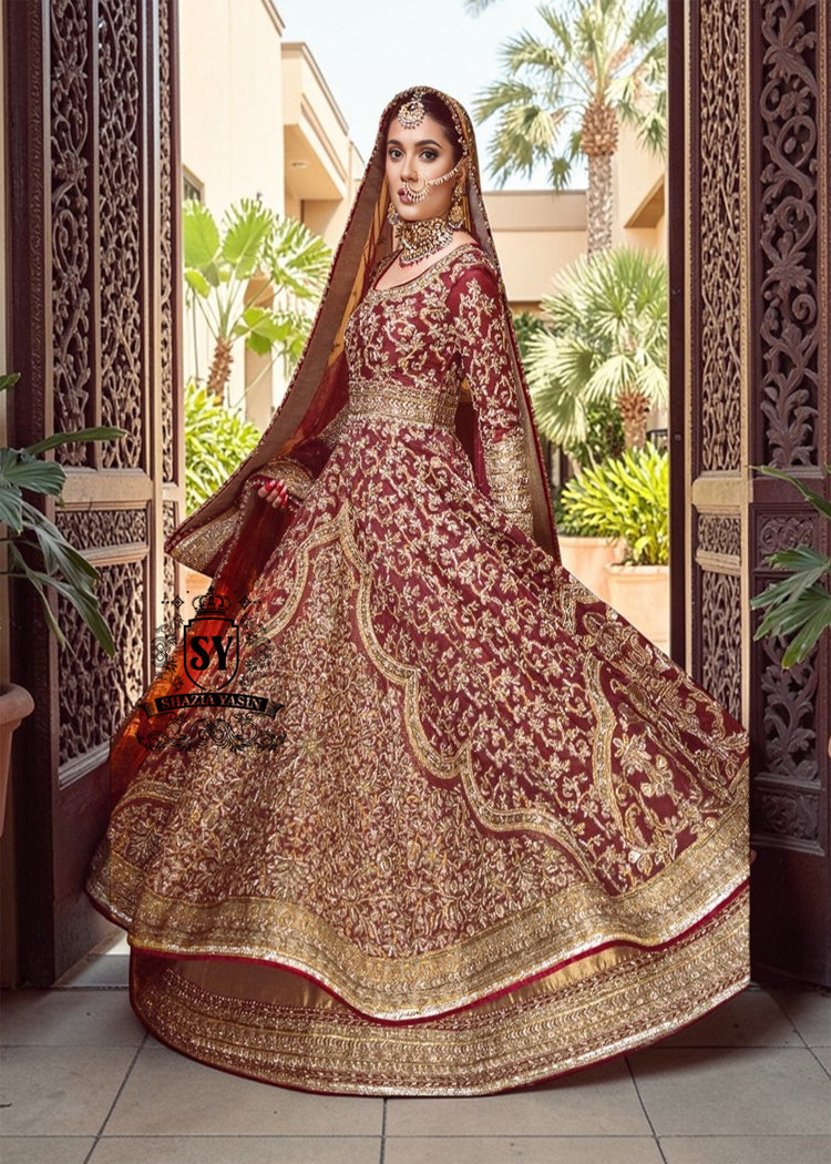 Flawless craftsmanship in the details meets a modern Anarkali silhouette. With its elegant Lehenga and captivating crystal embellishments, this is one of the most striking pieces from our collection.