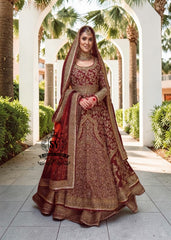 Flawless craftsmanship in the details meets a modern Anarkali silhouette. With its elegant Lehenga and captivating crystal embellishments, this is one of the most striking pieces from our collection.