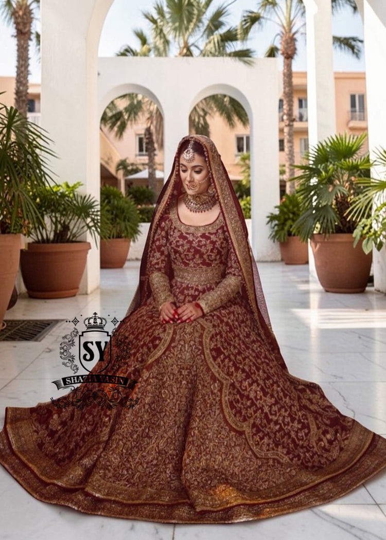 Flawless craftsmanship in the details meets a modern Anarkali silhouette. With its elegant Lehenga and captivating crystal embellishments, this is one of the most striking pieces from our collection.