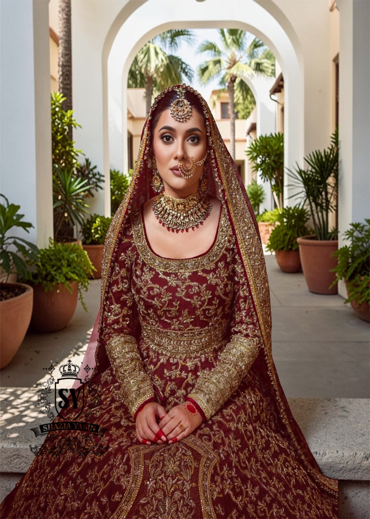 Flawless craftsmanship in the details meets a modern Anarkali silhouette. With its elegant Lehenga and captivating crystal embellishments, this is one of the most striking pieces from our collection.
