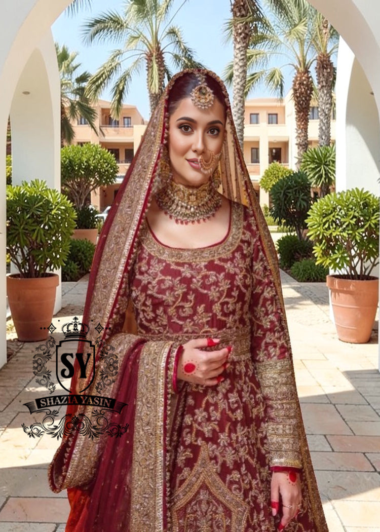 Flawless craftsmanship in the details meets a modern Anarkali silhouette. With its elegant Lehenga and captivating crystal embellishments, this is one of the most striking pieces from our collection.