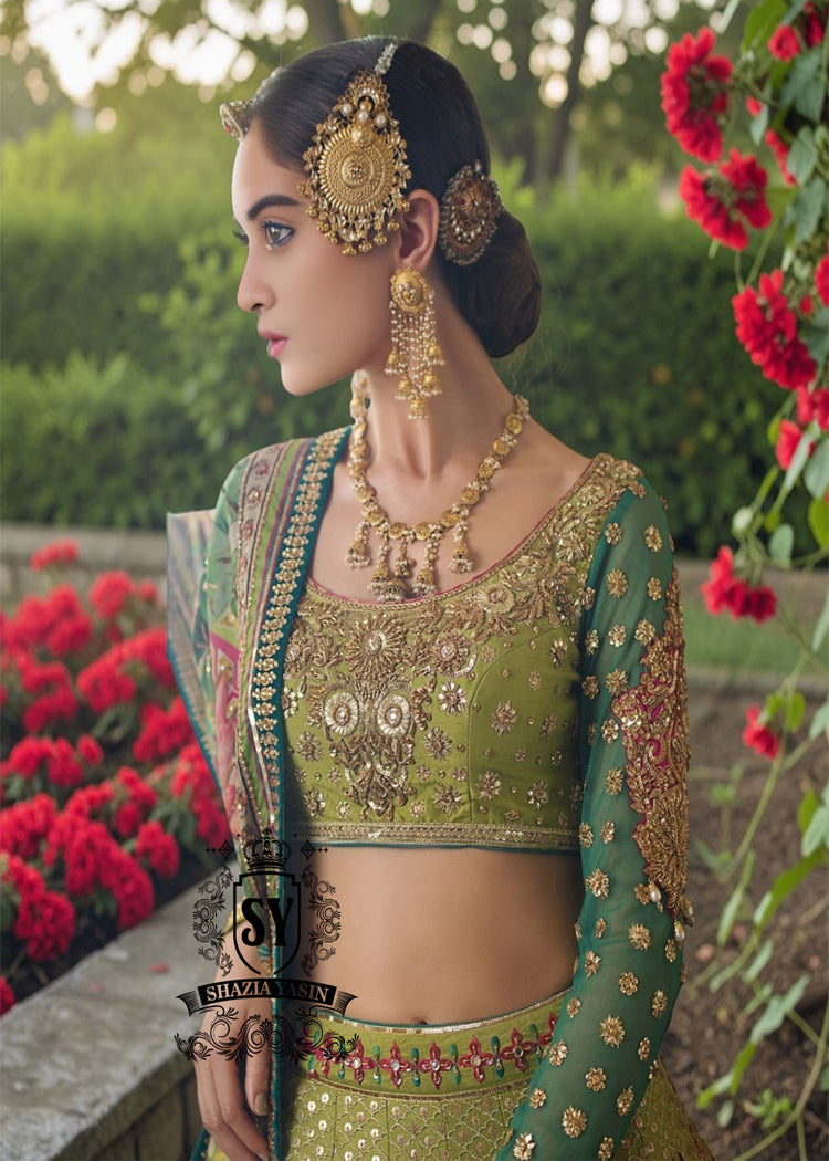 A stunning dark apple green lehenga featuring digital print and luxurious embroidery. The Choli Blouse is hand-applied with intricate floral appliqués, giving it a glamorous look. 
