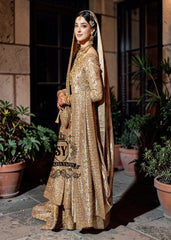 A majestic wedding dress made of luxurious Lame fabric in a lush farshi lehenga silhouette that radiates elegance. Long shirt creates an exquisite effect. The decor in the form of delicate flourishing embellishments adds romance.