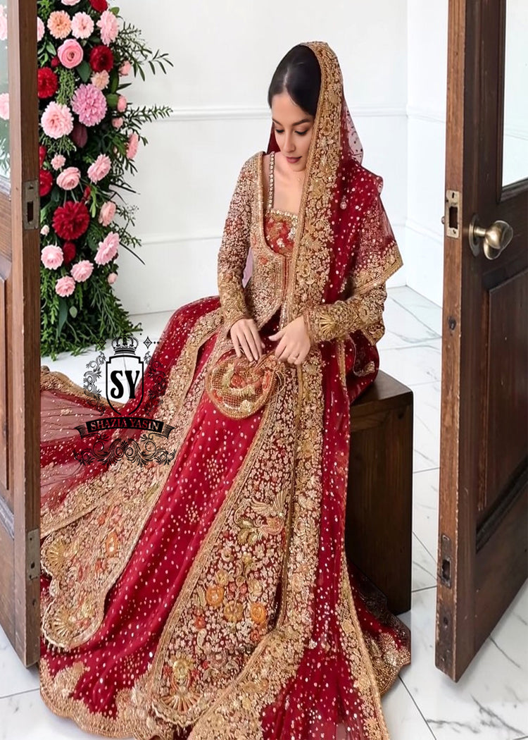 A vision of radiance and romance, custom-created for the stunning Bride. Every shimmering detail of this bridal gown Lehenga dress was designed to move with grace and leave a lasting impression. Witness the magic unfold—from her fitting session to the unforgettable wedding day.