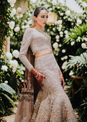 Mermaid wedding dress by Shazia Yasin. Elegant Lehenga design, high-quality fabrics, and a perfect fit for your special day. The unique design of a mermaid wedding dress always makes an impression, and with our Lehenga Choli designs, you'll win the hearts of your guests. See for yourself!