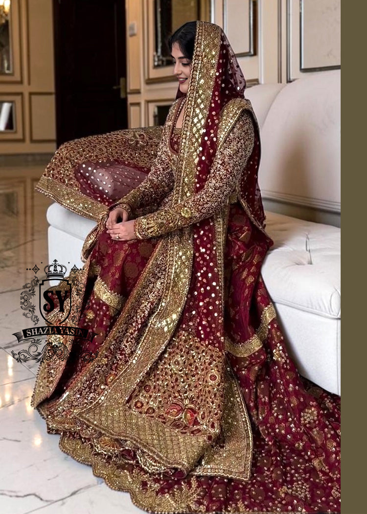 A wedding dress with a long train lehenga embroidered with crystals, created for an unparalleled look for the bride. The delicate embellishments softly sparkles with every movement, while the wedding gown silhouette beautifully highlights her natural elegance.