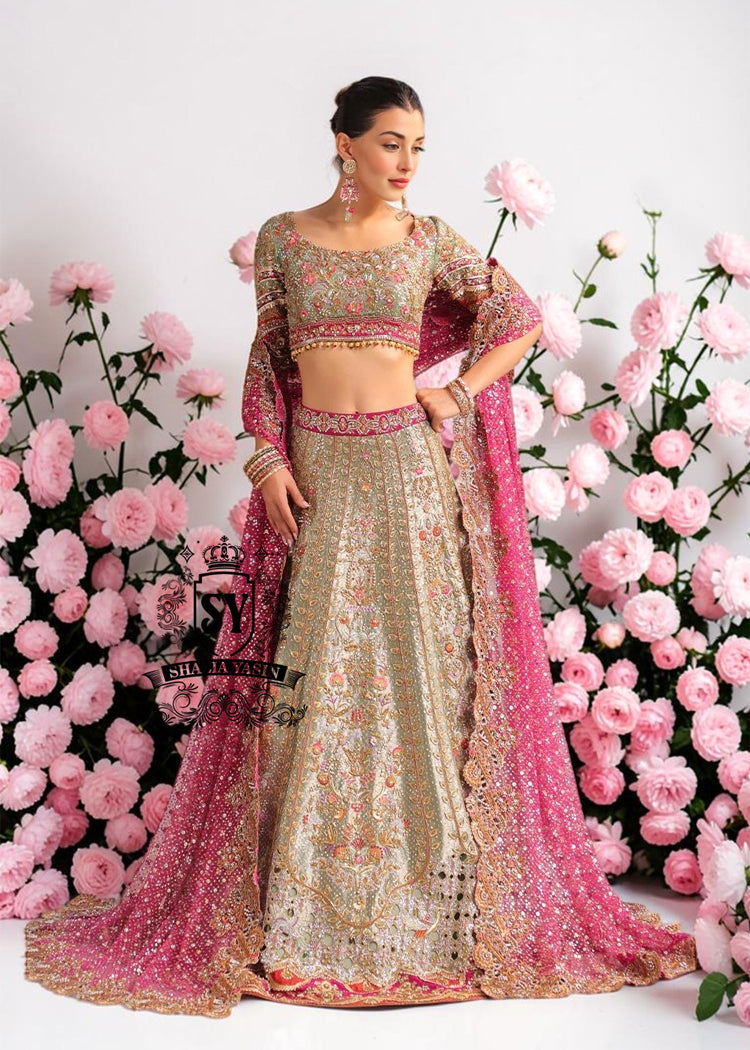 This Bridal dress is the true embodiment of elegance: delicate, silky Lame envelops the Lehenga silhouette, emphasizing every movement. Rich decoration creates a radiant effect - exquisite embroidery with pearls, beads and crystals adds depth and noble shine.