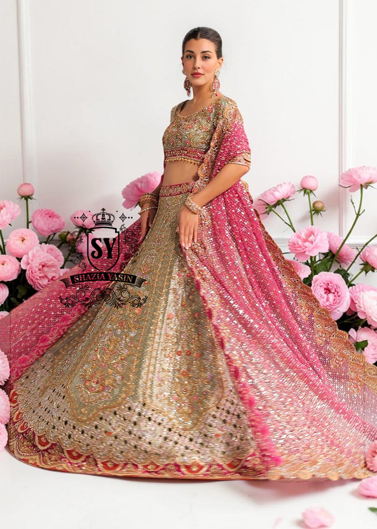 This Bridal dress is the true embodiment of elegance: delicate, silky Lame envelops the Lehenga silhouette, emphasizing every movement. Rich decoration creates a radiant effect - exquisite embroidery with pearls, beads and crystals adds depth and noble shine.