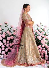 This Bridal dress is the true embodiment of elegance: delicate, silky Lame envelops the Lehenga silhouette, emphasizing every movement. Rich decoration creates a radiant effect - exquisite embroidery with pearls, beads and crystals adds depth and noble shine.