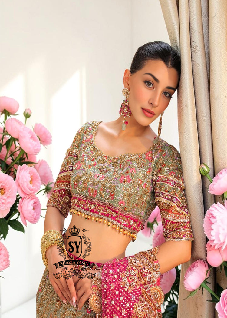 This Bridal dress is the true embodiment of elegance: delicate, silky Lame envelops the Lehenga silhouette, emphasizing every movement. Rich decoration creates a radiant effect - exquisite embroidery with pearls, beads and crystals adds depth and noble shine.