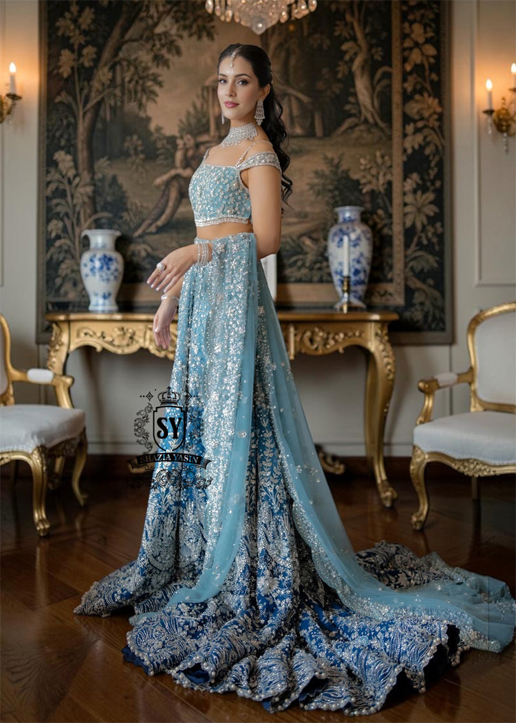 Feel like a queen in this spectacular wedding dress! Every detail, from the shimmering sequins to the delicate embellishments on the Lehenga Choli, is designed for an unforgettable entrance. 