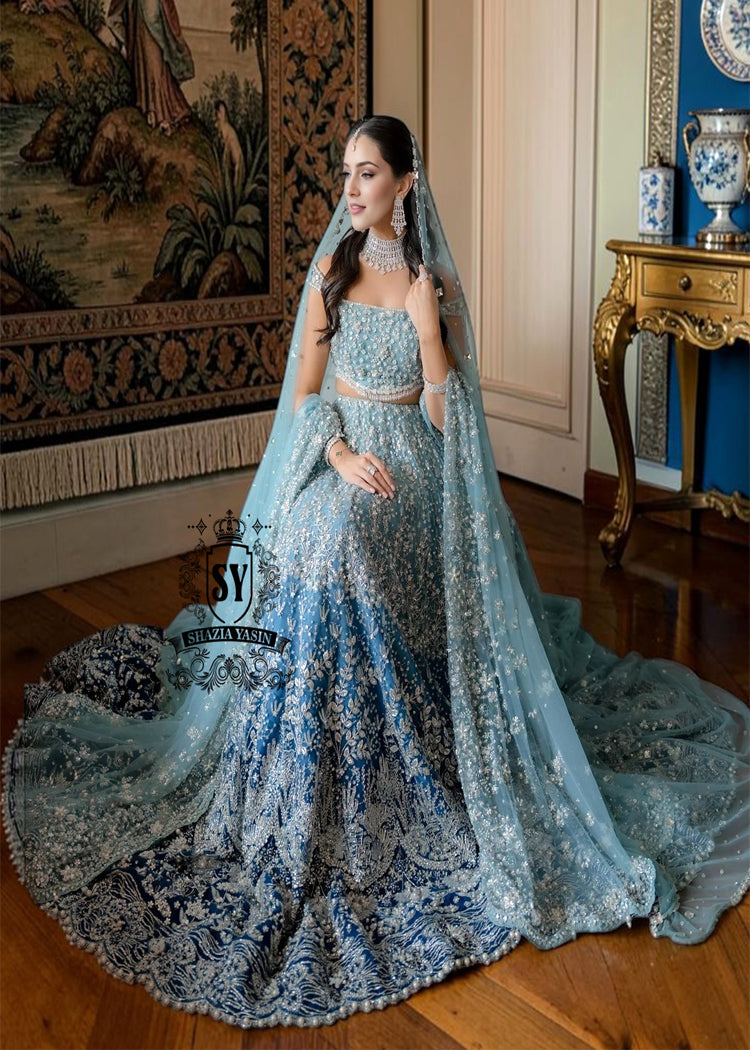 Feel like a queen in this spectacular wedding dress! Every detail, from the shimmering sequins to the delicate embellishments on the Lehenga Choli, is designed for an unforgettable entrance. 