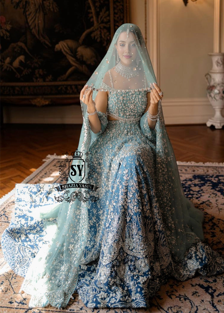 Feel like a queen in this spectacular wedding dress! Every detail, from the shimmering sequins to the delicate embellishments on the Lehenga Choli, is designed for an unforgettable entrance. 