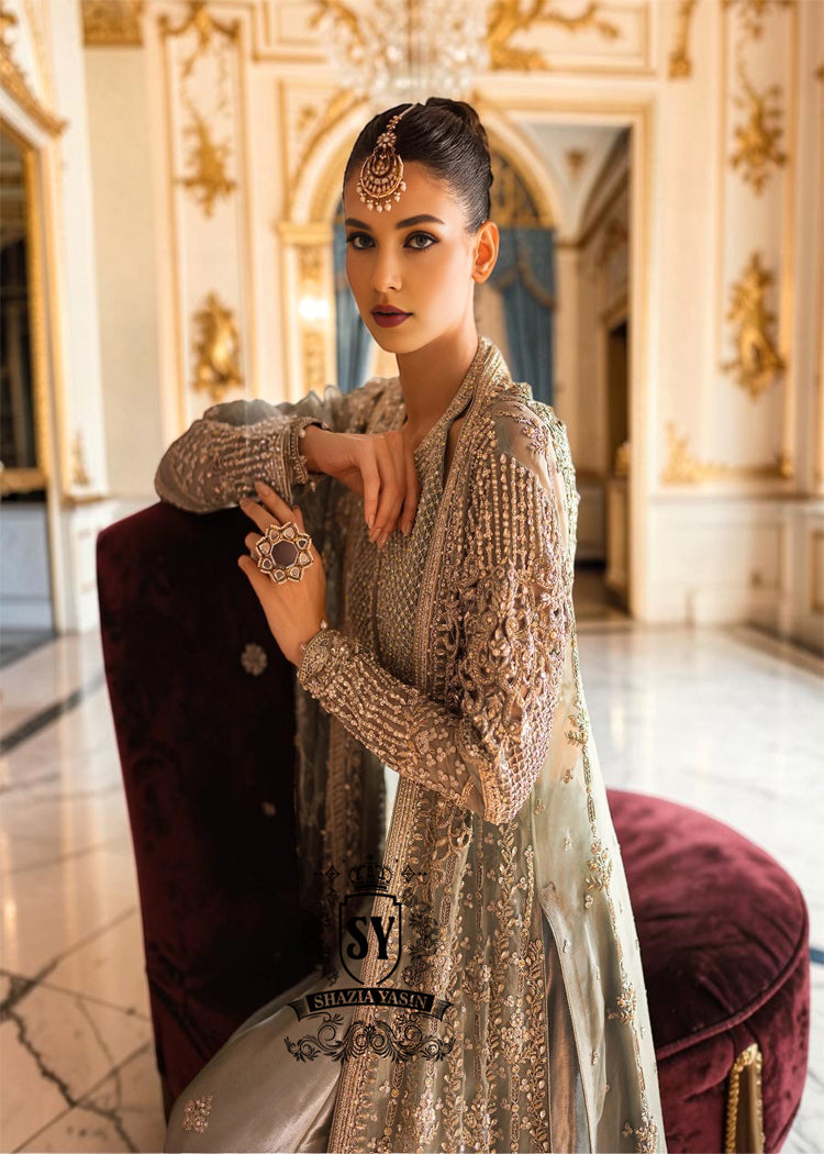 Fantastic Bridal dress in bright Crystal color will make your look extraordinary Original cut, luxurious embellishments, seductive Lehenga Choli style.