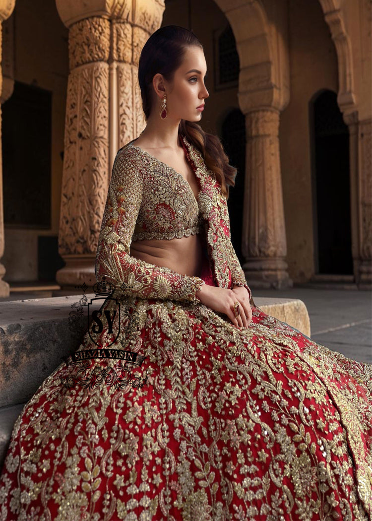 This Angels Red bridal dress is the epitome of grace and grandeur — a wedding lehenga choli dress crafted to perfection for your big day. Full of shine and feminine charm, this is a perfect choice for brides who want to subtly shine on their big day.