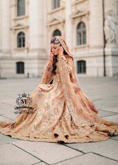 The dreamlike Gown & Lehenga silhouette, Straight out of fairy tale. Undeniably eye-catching, sparkly bridal dress is ideal for the bride seeking romance and glamor. This illuminating element reflects light beautifully adding enchanting details from head to toe.