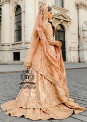 The dreamlike Gown & Lehenga silhouette, Straight out of fairy tale. Undeniably eye-catching, sparkly bridal dress is ideal for the bride seeking romance and glamor. This illuminating element reflects light beautifully adding enchanting details from head to toe.