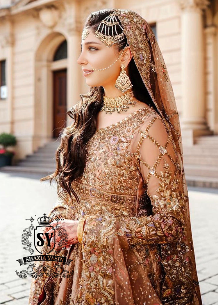 The dreamlike Gown & Lehenga silhouette, Straight out of fairy tale. Undeniably eye-catching, sparkly bridal dress is ideal for the bride seeking romance and glamor. This illuminating element reflects light beautifully adding enchanting details from head to toe.