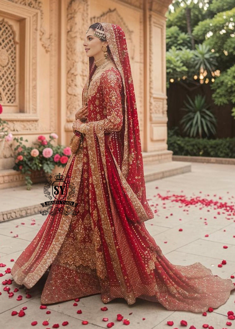 Radiating pure Amaranth Red bridal dress magic with two legged farshi lehenga. A perfect balance of grandeur and simplicity.
