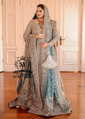 A royal look for a Full-figured bride will be created by this A-line long shirt with farshi lehenga dress made of luxurious lame fabric in Tradewind color.