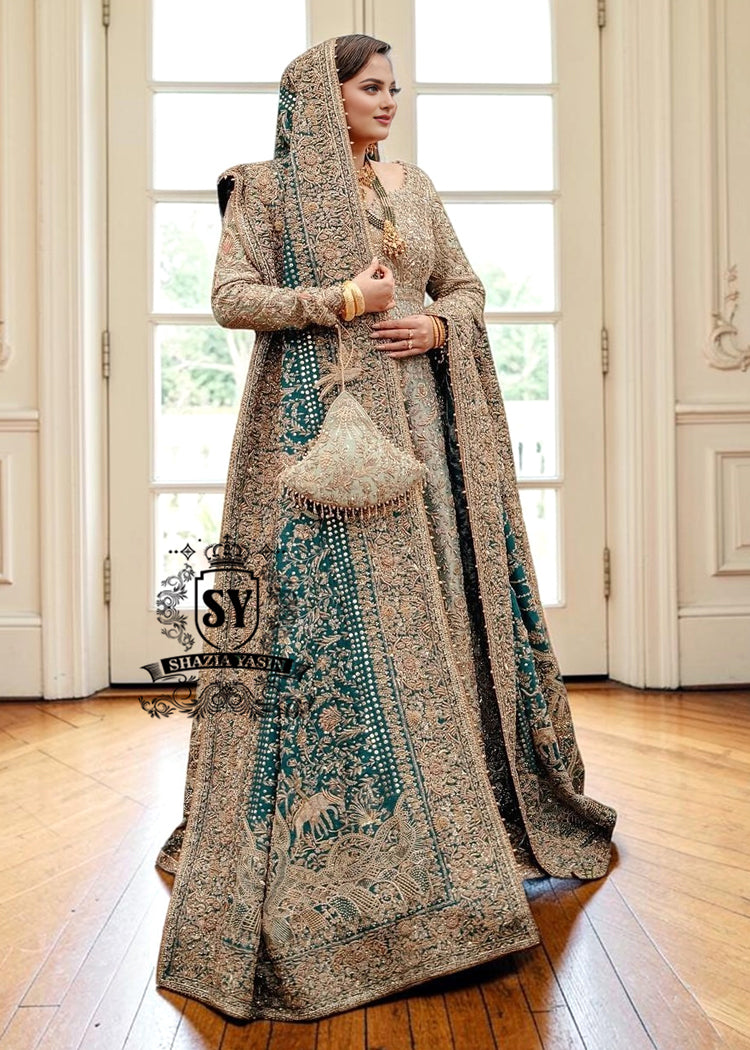 A royal look for a Full-figured bride will be created by this A-line long shirt with farshi lehenga dress made of luxurious lame fabric in Tradewind color.