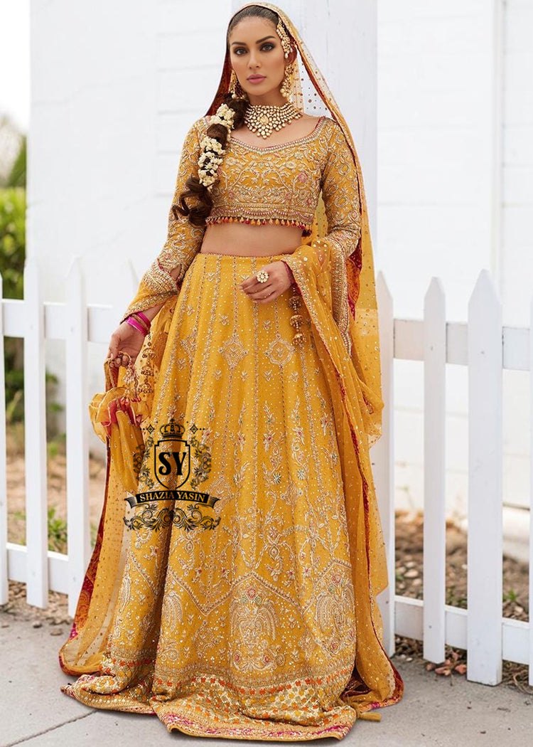 Envelop yourself in the magic of this Fluorescent Orange bridal dress is a perfect example of elegance and craftsmanship, designed for the bride who desires an unforgettable Mayon look.