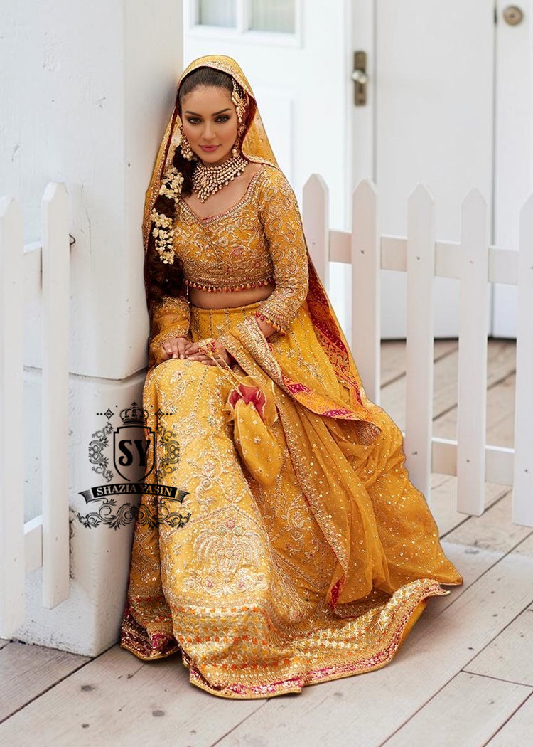 Envelop yourself in the magic of this Fluorescent Orange bridal dress is a perfect example of elegance and craftsmanship, designed for the bride who desires an unforgettable Mayon look.