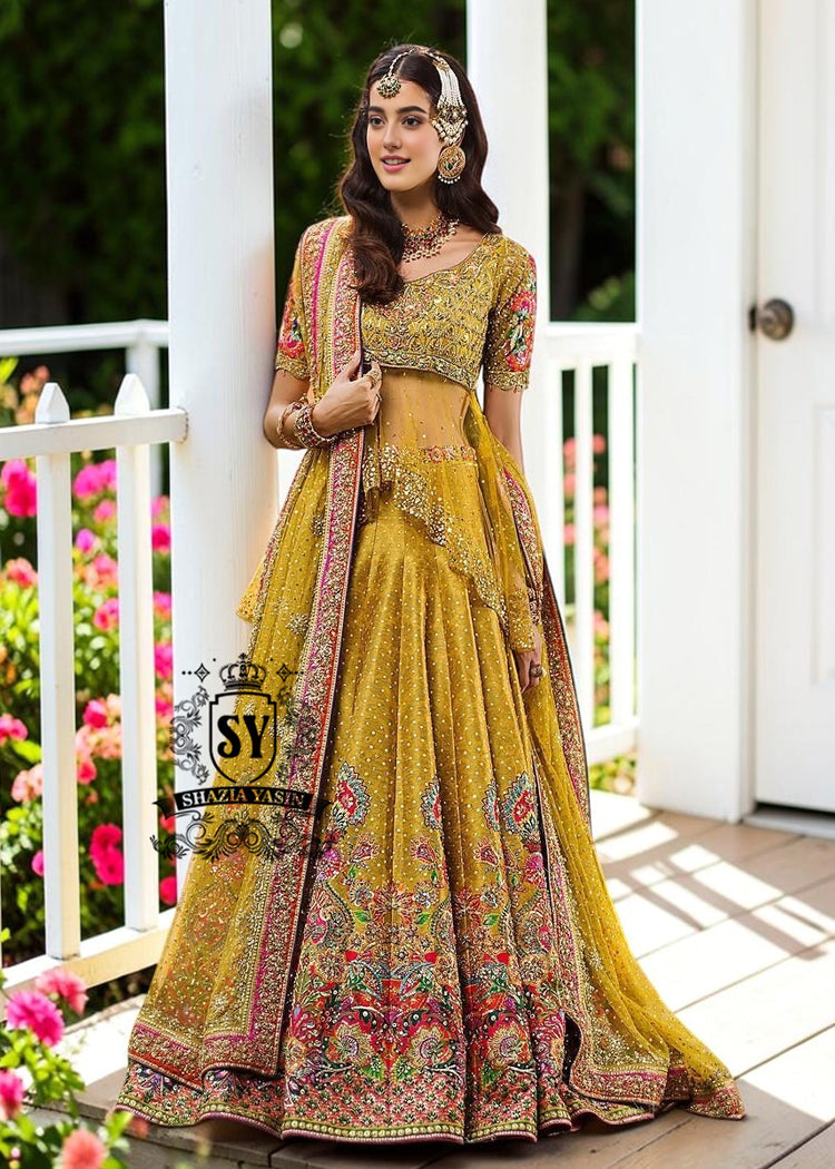 A dream transformed into elegance. This unique Lehenga Peplum design, gliding effortlessly against your skin with the lightness of silk tulle, evokes a fairy tale with every step.