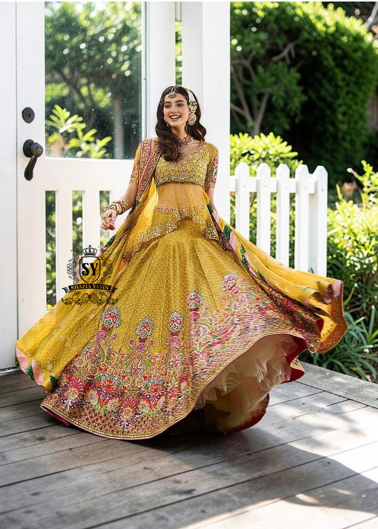 A dream transformed into elegance. This unique Lehenga Peplum design, gliding effortlessly against your skin with the lightness of silk tulle, evokes a fairy tale with every step.