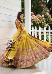 A dream transformed into elegance. This unique Lehenga Peplum design, gliding effortlessly against your skin with the lightness of silk tulle, evokes a fairy tale with every step.