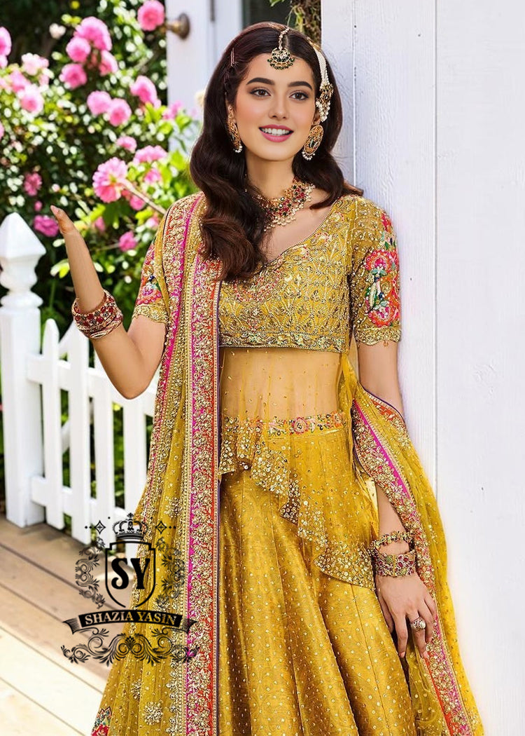 A dream transformed into elegance. This unique Lehenga Peplum design, gliding effortlessly against your skin with the lightness of silk tulle, evokes a fairy tale with every step.
