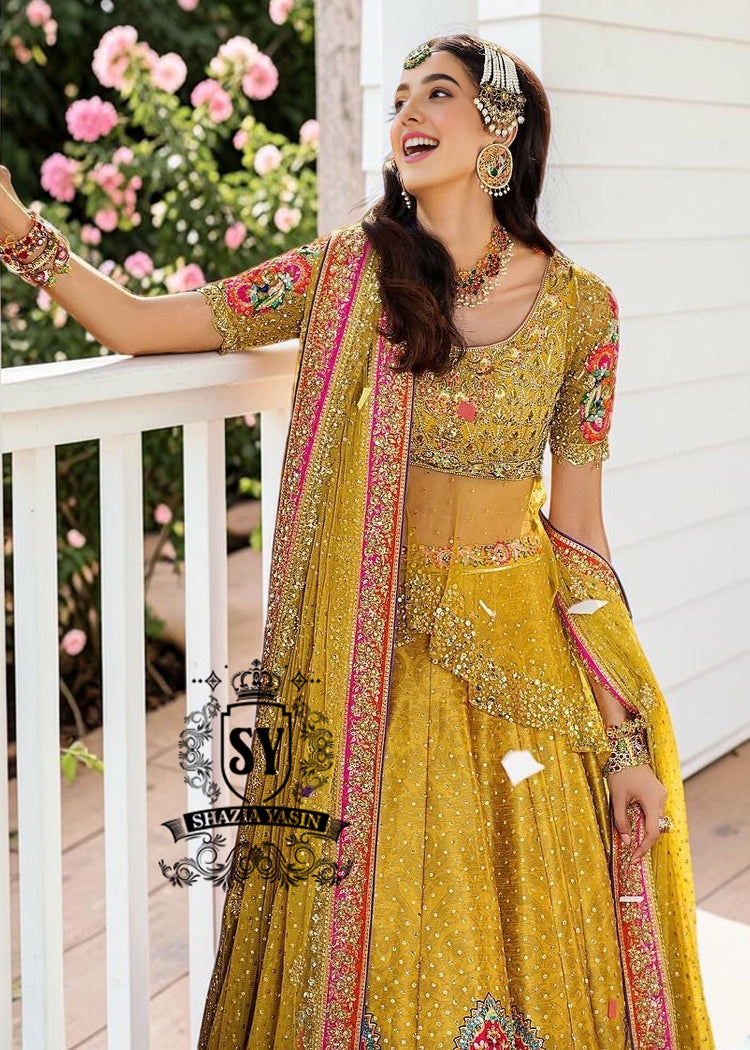 A dream transformed into elegance. This unique Lehenga Peplum design, gliding effortlessly against your skin with the lightness of silk tulle, evokes a fairy tale with every step.