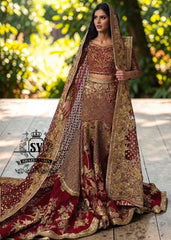 Obsessed with this sweetheart neckline glitter bridal dress. The cathedral train adds the perfect touch of elegance. The delicate shimmer and flattering lehenga silhouette make it a dream for any bride. Perfect for a romantic ceremony or a grand celebration.