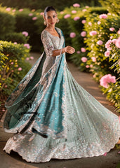 Exquisite bride in Lucky, luxe, flawless bridal dress with a fitted A-line gown & lehenga that flatters beautifully. Incredibly delicate look in the Aero Blue Bridal dress.