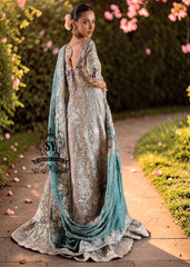 Exquisite bride in Lucky, luxe, flawless bridal dress with a fitted A-line gown & lehenga that flatters beautifully. Incredibly delicate look in the Aero Blue Bridal dress.