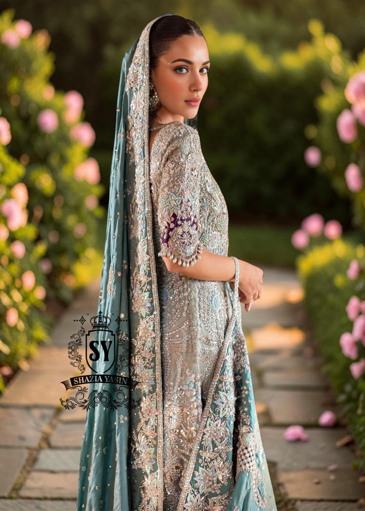 Exquisite bride in Lucky, luxe, flawless bridal dress with a fitted A-line gown & lehenga that flatters beautifully. Incredibly delicate look in the Aero Blue Bridal dress.