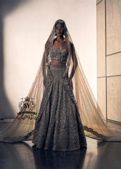 A luxurious bridal look, created by designers to fulfill your dream of a magnificent, fairytale-like bridal dress. Imagine yourself dancing in this bridal Lehenga Choli dress at the wedding hall, and you'll never want anything else. It's a stunning, super contemporary Lehenga design that definitely won't go unnoticed.