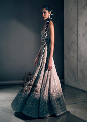 A luxurious bridal look, created by designers to fulfill your dream of a magnificent, fairytale-like bridal dress. Imagine yourself dancing in this bridal Lehenga Choli dress at the wedding hall, and you'll never want anything else. It's a stunning, super contemporary Lehenga design that definitely won't go unnoticed.