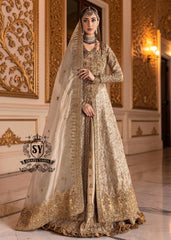 A Pakistani wedding dress is a captivating sight. Let your dreams become your wings in a wedding dress. This rich Beige gold maxi dress is adorned with carefully placed vibrant motifs, each crafted using tilla, kora Dabka, stones, sequins, beads, silk threads and swarovski crystals, and zardozi techniques.