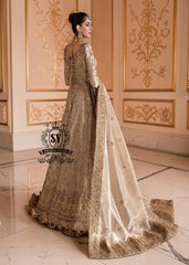 A Pakistani wedding dress is a captivating sight. Let your dreams become your wings in a wedding dress. This rich Beige gold maxi dress is adorned with carefully placed vibrant motifs, each crafted using tilla, kora Dabka, stones, sequins, beads, silk threads and swarovski crystals, and zardozi techniques.