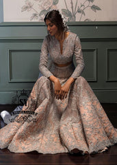 Bride in a bespoke bridal Lehenga choli dress is a celebration of romance and craftsmanship — adorned with tens of thousands of hand-sewn crystals that glisten like stardust on layers of ethereal tulle.