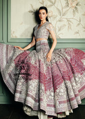Amaranth purple Lehenga choli Bridal dress is the embodiment of royal grandeur. A stunning wedding dress, every detail of which is designed to captivate. Exquisite embellishments, a sophisticated blouse, luxurious Beaded sleeves, and a delicate neckline create a truly aristocratic bride.