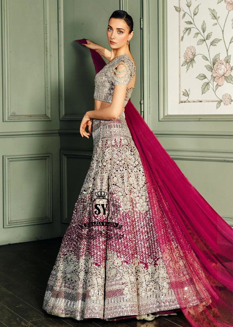 Royal aesthetic Lehenga choli Bridal dress is the embodiment of royal grandeur. A stunning wedding dress, every detail of which is designed to captivate. Exquisite embellishments, a sophisticated blouse, luxurious Beaded sleeves, and a delicate neckline create a truly aristocratic bride.