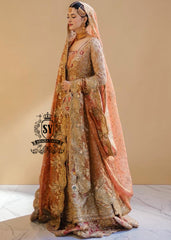The Sultry beige color adds a modern touch to the traditional wedding dress. This ensemble is perfect for brides who want to combine classic elegance with contemporary fashion. A premium Pishwas Lehenga design ideal for brides seeking an elegant, sophisticated, and striking look.