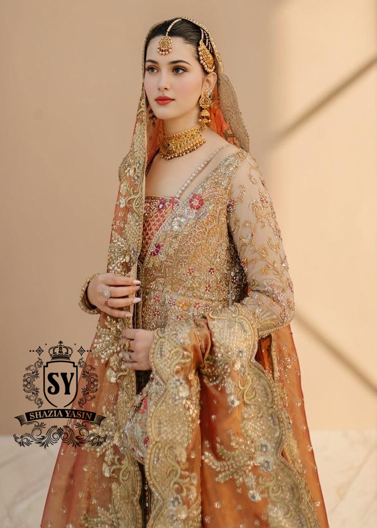 The Sultry beige color adds a modern touch to the traditional wedding dress. This ensemble is perfect for brides who want to combine classic elegance with contemporary fashion. A premium Pishwas Lehenga design ideal for brides seeking an elegant, sophisticated, and striking look.