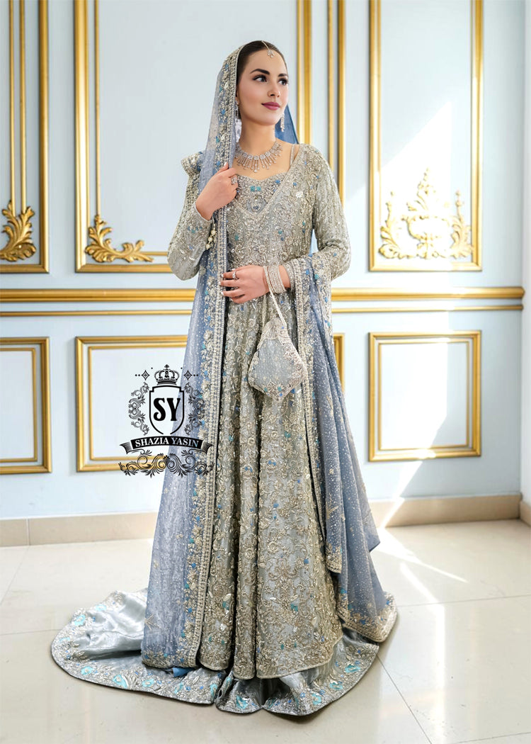 Discover Shazia Yasin’s Silver Chalice Bridal Dress with Blue Haze Lehenga, exquisitely embellished with silver zardozi and crystal embroidery. Perfect for engagement, Nikah or walima brides, this outfit captures royal tradition and luxury.