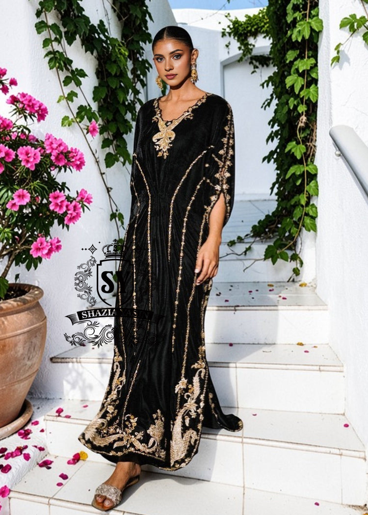 Be dazzling with this elegant black velvet Kaftan dress. Designed with both classic and modern lines, black velvet Kaftan dresses add a sophisticated touch to your wardrobe. Experience the elegance of this unique Embellished Kaftan at Shazia Yasin.