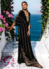 Be dazzling with this elegant black velvet Kaftan dress. Designed with both classic and modern lines, black velvet Kaftan dresses add a sophisticated touch to your wardrobe. Experience the elegance of this unique Embellished Kaftan at Shazia Yasin.