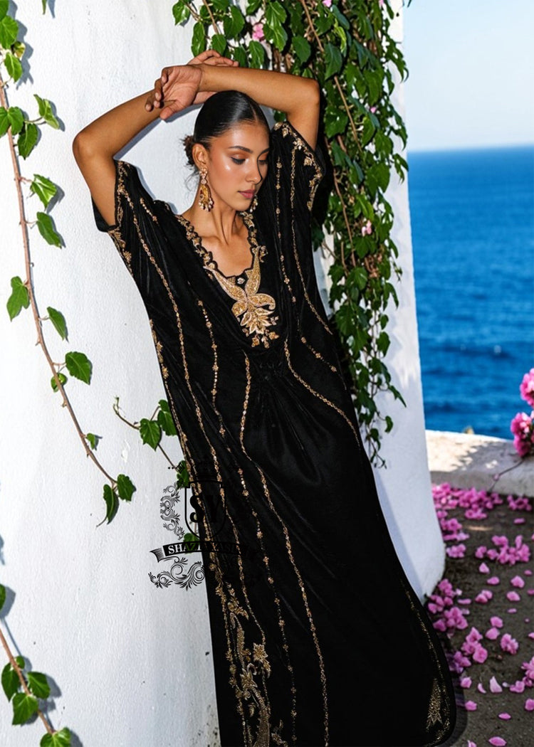 Be dazzling with this elegant black velvet Kaftan dress. Designed with both classic and modern lines, black velvet Kaftan dresses add a sophisticated touch to your wardrobe. Experience the elegance of this unique Embellished Kaftan at Shazia Yasin.
