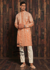 Expertly embroidered for a sophisticated look, the SY Couture Peach Men's Kurta Pajama is the perfect blend of style and comfort. Made with high-quality fabric, it features an elegant design and superior stitching for a lasting impression. Elevate your wardrobe with this timeless piece for any occasion.